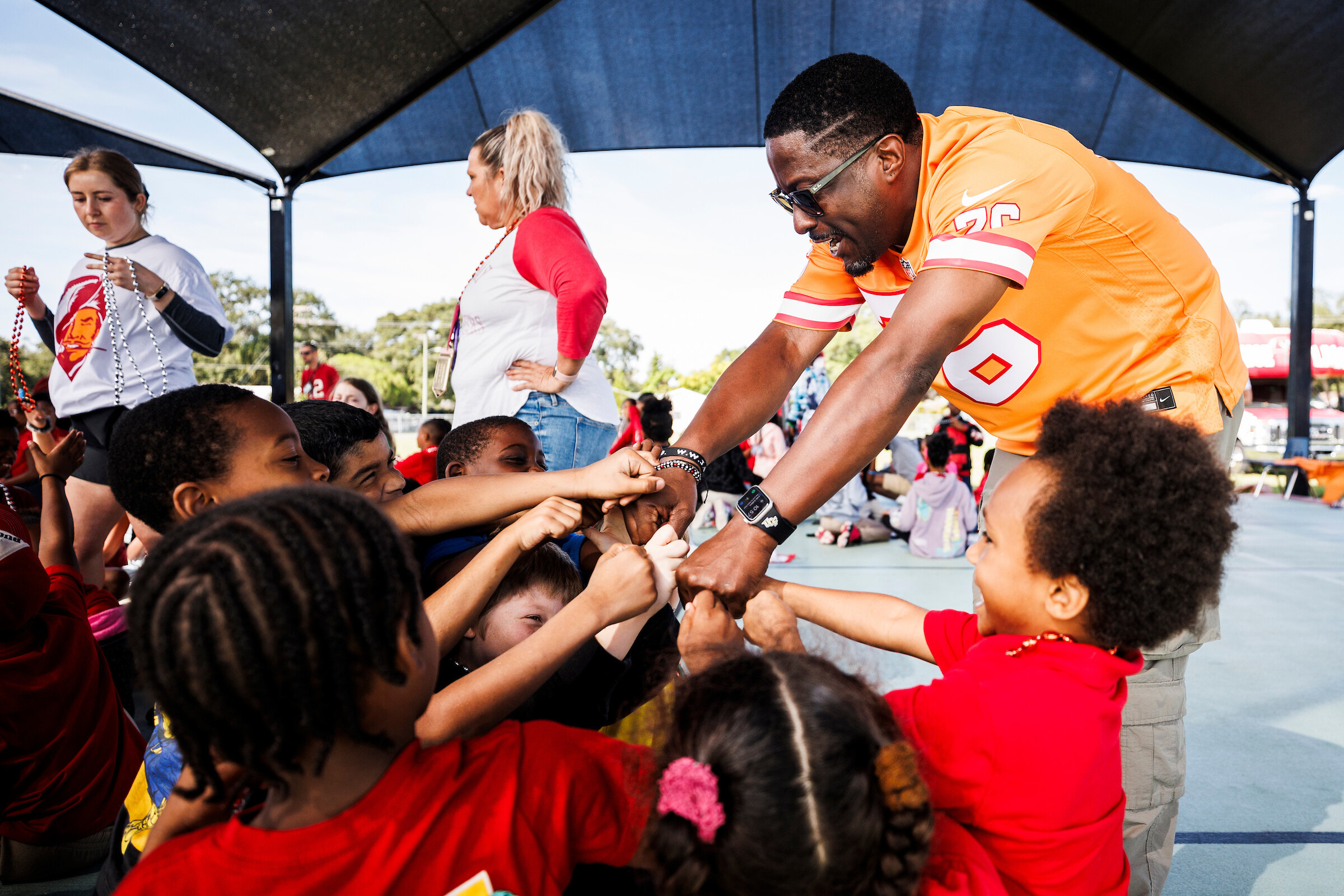 DJ Ekin with some kids at the PepRally
